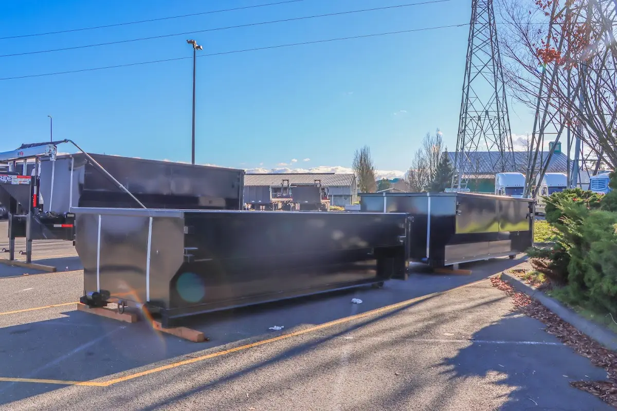 Roll-off dumpster ready for waste disposal at job site for 3 Yard Dumpster Rental in Richmond Heights